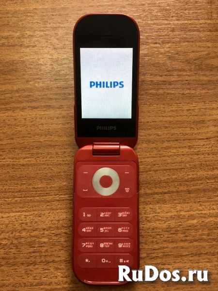 Мобильный телефон Philips E320 Red, поддержка 2sim-карт фото